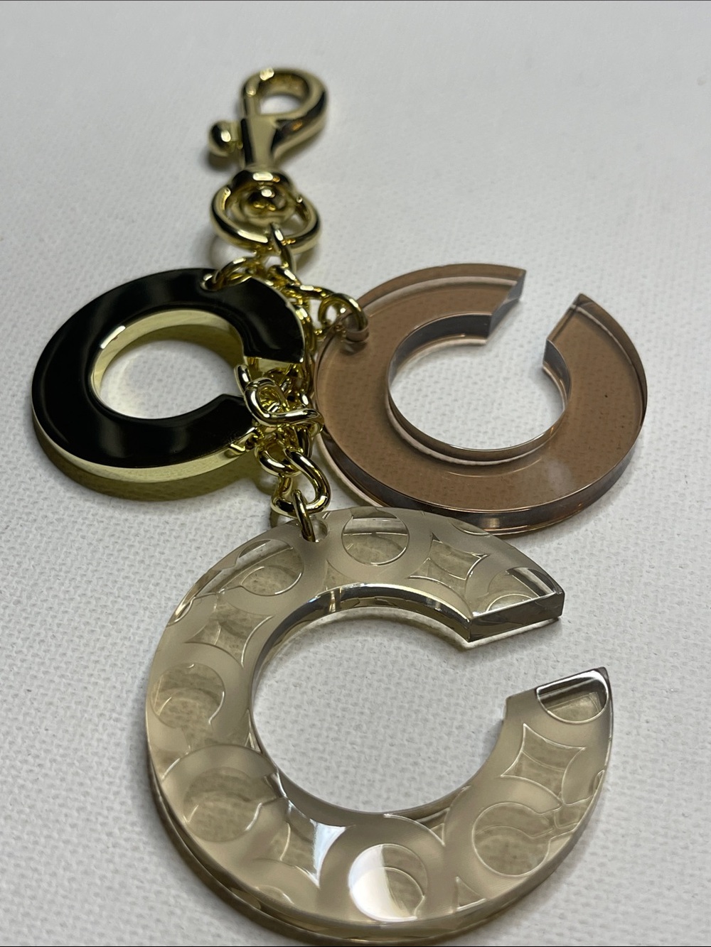 Coach Acrylic C Charm Keychain in Black, Tan, Clear with Gold Hardware